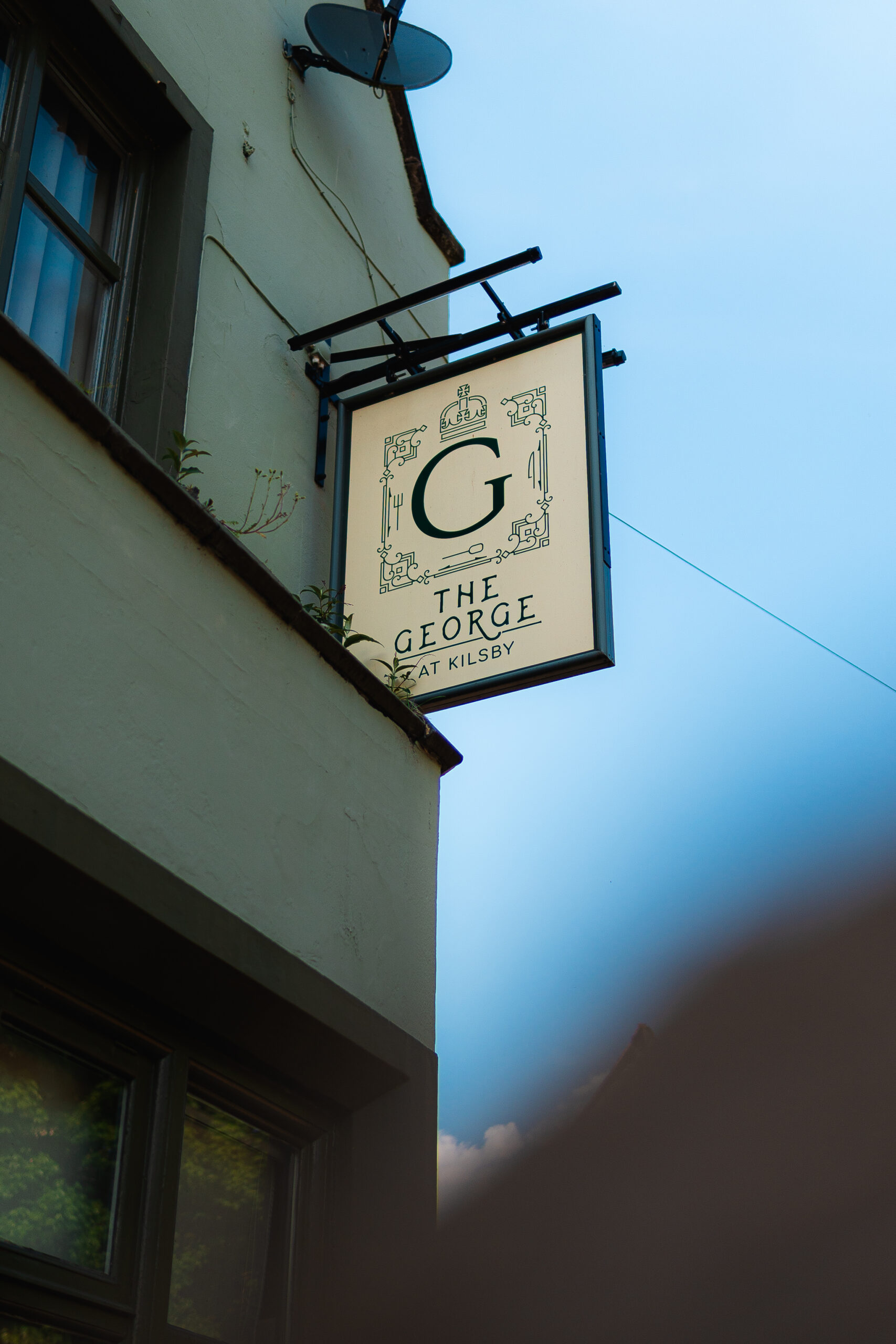 The George in Rugby Sign